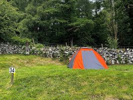 Pitch 34 is up a short steep hill and furthest away.