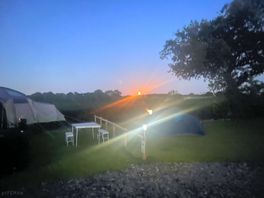 A stunning full red moon above the beautiful countryside. the camera didn’t do it justice!