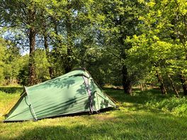 Small pitch accommodating a two-man tent