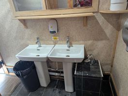 Washing bowls in mens toilet, hardly functional