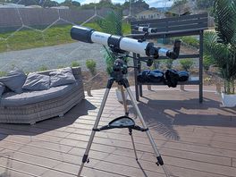 Telescope and seating in dome