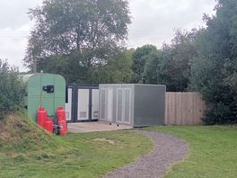 Pizza van right next to the toilets and showers