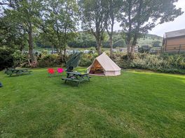 Tent site next to stream.