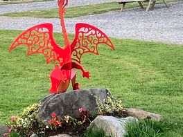 Welsh dragon statue located on caravan pitches.