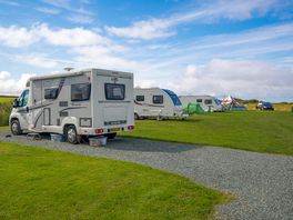 The grass pitches and one of the hardstandings