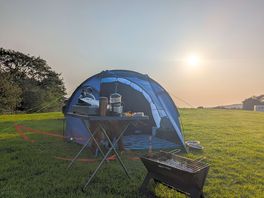 Sunset over the camping field