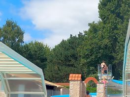 Covered pool and slide pool.