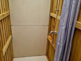 Bonus the shower head unhooks for washing sand of younger kids