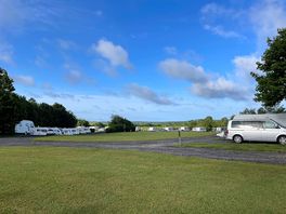 View of the pitches and the fishing lake