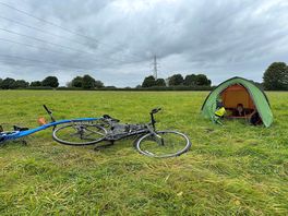 Tent and bike camped at danes moss farm