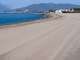 Beach through gate