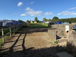 Electric pitches from toilet block
