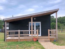 Nightingale Lodge with its private veranda, ideal spot to watch the sunset or star gaze