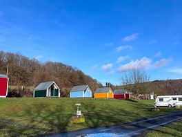 Cute little cabins which you could stay in.