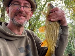 Great catch at the beautiful fishing lake — peaceful spot and plenty of fish!