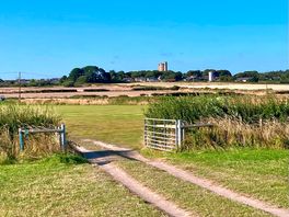Entrance to second field and roch castle on the horizon