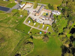 Birds eye view of the beutiful cafe, and caravan bays.