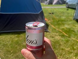 Enjoying the sun with my book and a drink