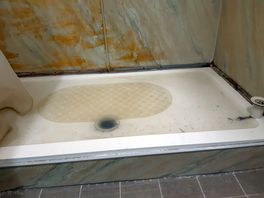 Flooded shower tray