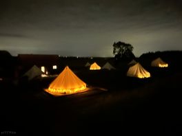 Bell tents by night
