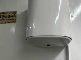 Empty paper towel dispenser