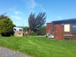 Summer house and toilets / shower block.