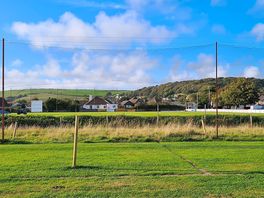 Next to the cricket club