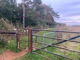 The access gate to the path down to the waste disposal point and the washroom.