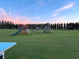 Climbing frames as sun setting