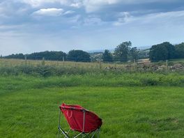 Chair with a picturesque view , field of cows 🐮 - taken from top pitch beautiful sunrises /sunsets