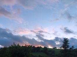 A view of the hill a sunset