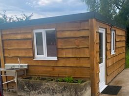 New and clean toilet / shower block near cars