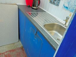 Kitchen area with no hot water.