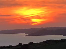 Sunset from pitch 19 over the bay.