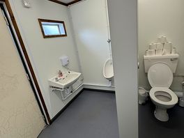Toilet block with urinal
