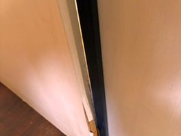 Toilet door that does not shut - assume it's been kicked open or broken in some way
