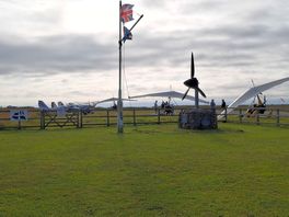 Admiring old spitfire, looking out to the runway!