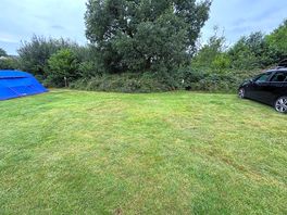 Our plot with electric. near to entrance and hut