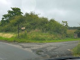 Entrance to the single track road to the site.