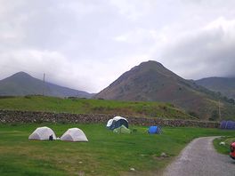 View of pitch walking from the reception at night.