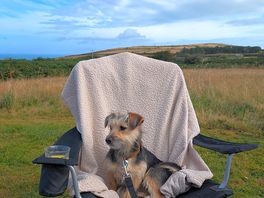 Enjoying some relaxing time with the ocean behind.