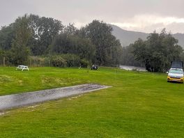 Camping pitches along fence