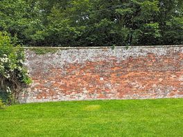Non electric grass pitch suitable for tents only. Gently sloping.