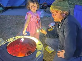 Toasting marshmallows on fire pit