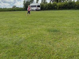 Having fun playing ball games.