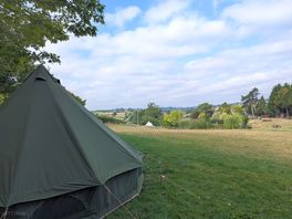 View to the pond and hills beyond