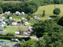 Spacious grass pitches with optional electric hook-ups