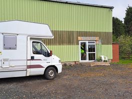 Hard standing pitch and entrance to toilets.
