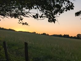 Sunset from path near site