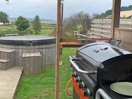Bbq and toilet area with cracking view.